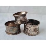 A scroll engraved and pierced napkin ring B'ham 1908 and two others - 49 gms