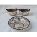 A pair of oval half fluted salts B'ham 1904 and a embossed dish