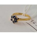 A sapphire and diamond ring 18ct gold size m - 2.9 gms