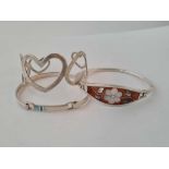 Three silver bangles