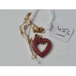 A ruby and diamond heart pendant necklace - 2.1 gms