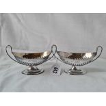 A pair of late Victorian boat shaped salts with gilded bowls 5 inches wide London 1894 - 119 gms