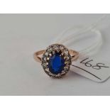 A blue and white stone ring 9ct size p - 3.2 gms