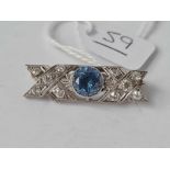 A ART DECO HIGH CARAT DIAMOND AND SAPPHIRE (APPROX. 1.50 CTS ) BROOCH