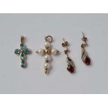 A pearl cross a blue stone cross and a pair of garnet earrings all 9ct