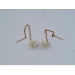 A pair of white stone 9ct ball earrings