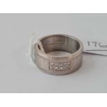 A heavy silver ring with clear stones bearing TIFFANY stamp size U