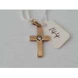 A diamond set 9ct cross 2.8g inc