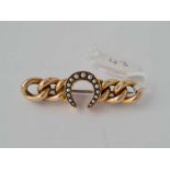 An antique gold and pearl horseshoe bar brooch 4.5cm long 6.2g inc