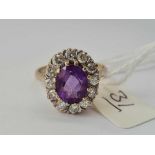 A GOOD AMETHYST & DIAMOND 18CT GOLD CLUSTER RING size P 6.4g