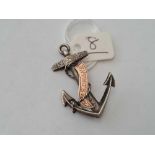 A silver and gold anchor brooch "HMS Drake"