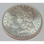 1886 USA silver dollar. B. Unc