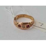 A pretty Victorian three stone ruby and diamond gypsy set ring 9ct size Y - 4.5 gms