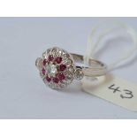 A VINTAGE RUBY AND DIAMOND CLUSTER RING 18CT WHITE GOLD SIZE L