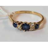 A seven stone sapphire & diamond ring in 18ct gold mount size M 2.2g inc