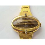 A ladies oval wrist watch by Corso