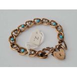 A Victorian gold plated bracelet set with pearls and turquoise 10ct gold heart clasp
