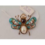 A attractive pearl and enamel moth brooch