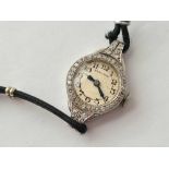 A LADIES PLATINUM AND DIAMOND EARLY 20TH CENTAURY COCKTAIL WATCH BY HAMILTON