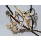 A bag of numerous ladies wrist watches