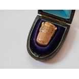 A vintage 9ct thimble in fitted case 4.7g