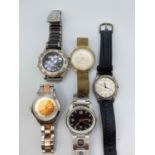 A bag of assorted gents wrist watches