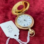 A pretty ladies rolled gold half hunter fob watch with seconds dial (W/O)