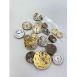 A bag of watch movements including two by Omega