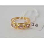 A pink sapphire and 18ct gold ring size M 2.6g