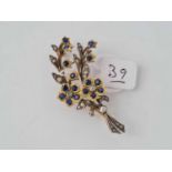 A diamond and sapphire antique floral gold brooch 5.5cm long 9.7g inc