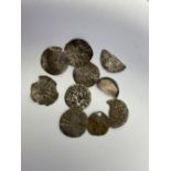 Five Edward I silver pennies, five more damaged detector finds
