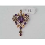A pretty amethyst and seed pearl drop pendant set in yellow metal