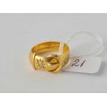 A DIAMOND BUCKLE RING 18 ct gold - R 1/2 - 6.5 g.