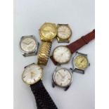 A bag of seven gents wrist watches