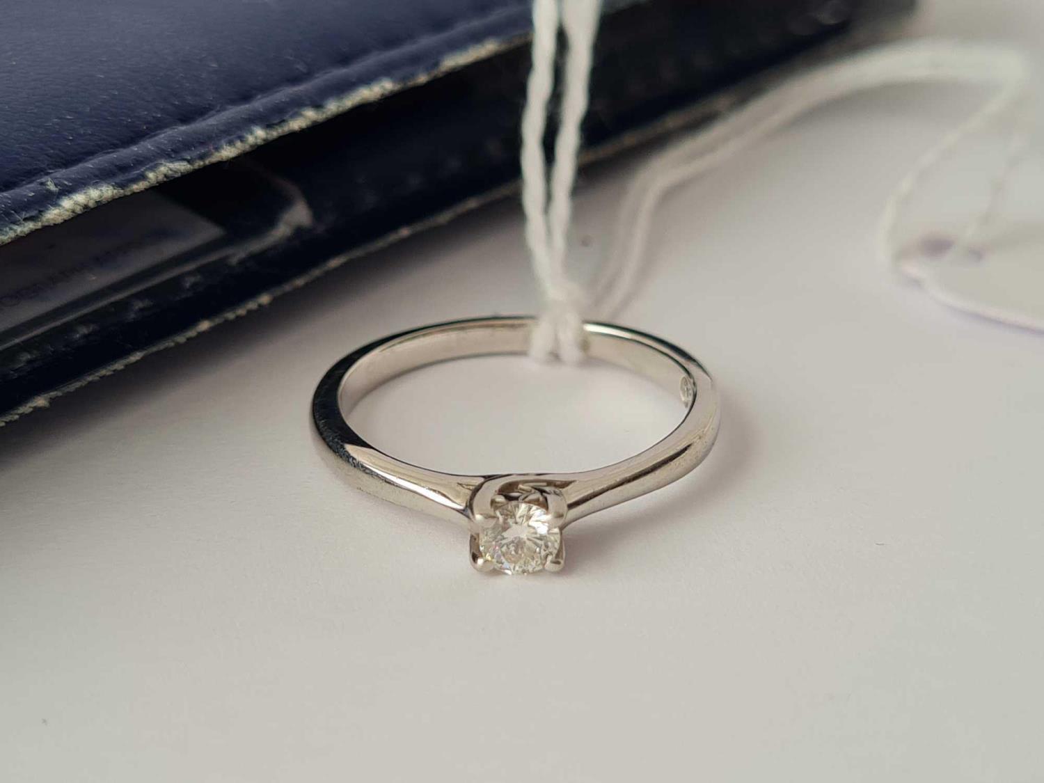 A solitaire diamond ring set in platinum with full C.O.A size N 3.6g inc - Image 2 of 4