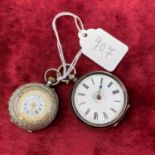 Two ladies silver fob watches, one in pretty silver and enamel case, the other requiring attention