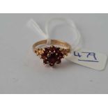 A garnet cluster ring 9ct size M