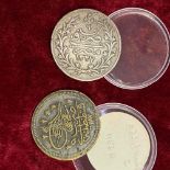 Two Middle Eastern crown sized coins