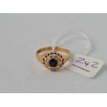 A Edwardian sapphire and diamond cluster ring Chester 1918 18ct gold size R 1/2 - 3 gms