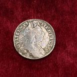 A William III sixpence 1696