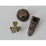 A Scottish brooch and two others