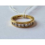 A seven stone diamond ring 18ct gold size J - 3.4 gms