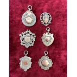 Six gold and silver fobs 64 g all hallmarked