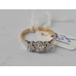 A three stone diamond ring 18ct gold size N - 3. gms