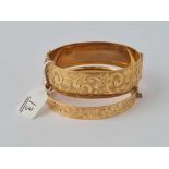 Two rolled gold hinged bangles ( one sold with 1974 receipt - 61 rand )