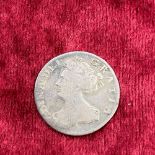 A Queen Anne sixpence 1705