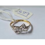 A diamond heart and bow ring 18ct gold size L - 2.8 gms