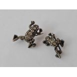 Two silver and paste frogs