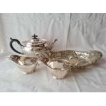 Oval half fluted teapot , bread dosh and a pair sauce boats