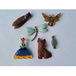 A caved horn brooch and others including a butterfly example